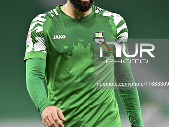 Driss Fettouhi of Al Ahli SC plays in the Ooredoo Qatar Stars League 24/25 match between Al Ahli SC and Al Duhail SC at Al Thumama Stadium i...