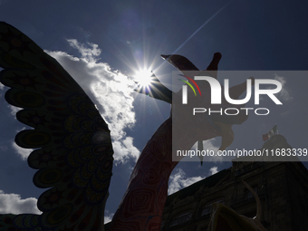 A backlit view of the monumental alebrijes route takes place on Saturday, October 19, 2024, from the Zocalo of Mexico City to Paseo de la Re...