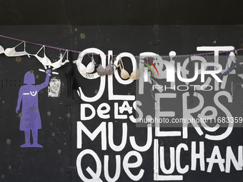 A clothesline of bras is placed at the Glorieta de las Mujeres que Luchan in Mexico City, Mexico, on October 19, 2024, by women who survive...