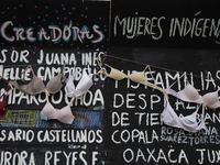 A clothesline of bras is placed at the Glorieta de las Mujeres que Luchan in Mexico City, Mexico, on October 19, 2024, by women who survive...