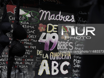 A clothesline of bras is placed at the Glorieta de las Mujeres que Luchan in Mexico City, Mexico, on October 19, 2024, by women who survive...