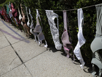 A clothesline of bras is placed at the Glorieta de las Mujeres que Luchan in Mexico City, Mexico, on October 19, 2024, by women who survive...