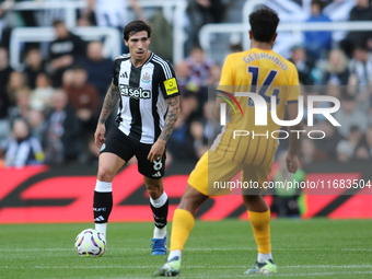 Sandro Tonali is under pressure during the Premier League match between Newcastle United and Brighton and Hove Albion at St. James's Park in...