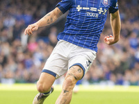 Leif Davis of Ipswich Town is on the ball during the Premier League match between Ipswich Town and Everton at Portman Road in Ipswich, Engla...