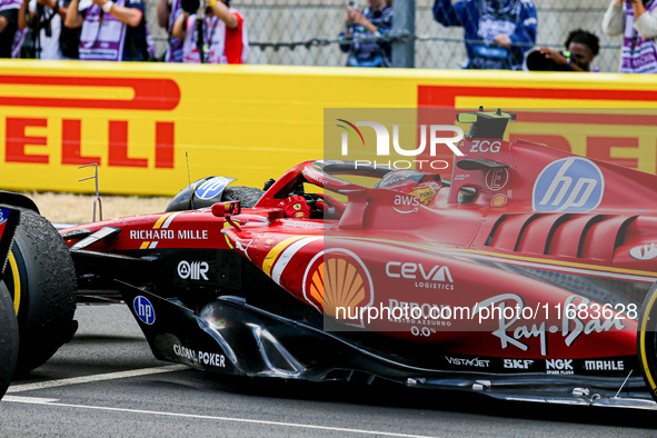 Carlos Sainz Jr. of Spain drives the (55) Scuderia Ferrari SF-24 Ferrari during the Formula 1 Pirelli United States Grand Prix 2024 in Austi...