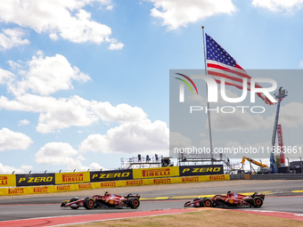 A fight occurs between the two Ferraris of Charles Leclerc of Monaco, driving the (16) Scuderia Ferrari SF-24 Ferrari, and Carlos Sainz Jr....