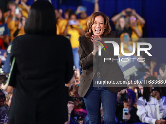 Waterford, MICHIGAN - OCTOBER 18: US Vice President and Democratic presidential candidate Kamala Harris walks onto the stage after being int...