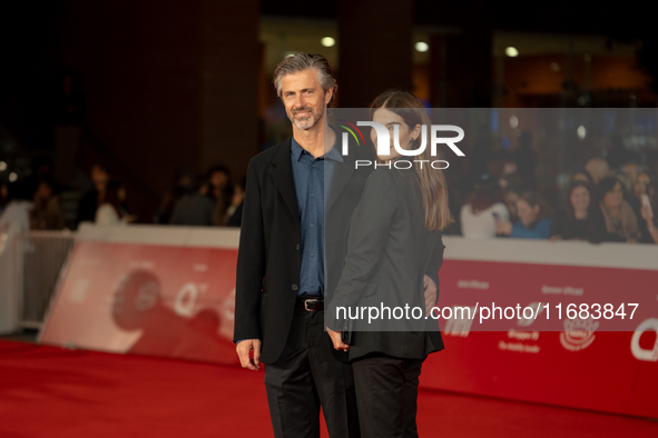 Kim Rossi Stuart and Ilaria Spada attend the ''Eterno Visionario'' red carpet during the 19th Rome Film Festival at Auditorium Parco Della M...