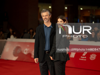 Kim Rossi Stuart and Ilaria Spada attend the ''Eterno Visionario'' red carpet during the 19th Rome Film Festival at Auditorium Parco Della M...