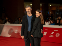 Kim Rossi Stuart and Ilaria Spada attend the ''Eterno Visionario'' red carpet during the 19th Rome Film Festival at Auditorium Parco Della M...