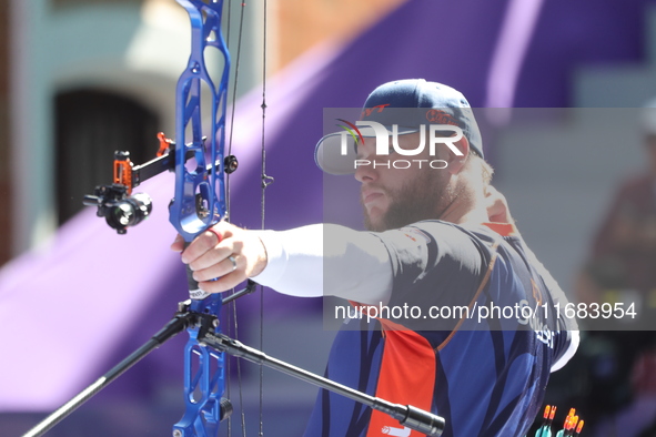 Mike Schloesser of the Netherlands competes against Sawyer Sullivan of the United States (not in picture) during the quarterfinals match on...