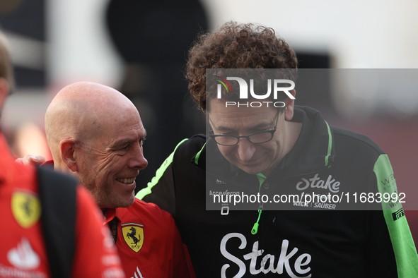 Mattia Binotto speaks to an old colleague as he arrives at Circuit of the Americas in Austin, Texas, on October 19, 2024, during the Formula...