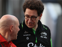 Mattia Binotto speaks to an old colleague as he arrives at Circuit of the Americas in Austin, Texas, on October 19, 2024, during the Formula...