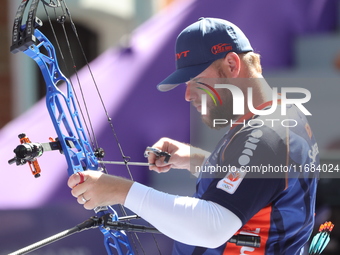 Mike Schloesser of the Netherlands competes against Sawyer Sullivan of the United States (not in picture) during the quarterfinals match on...