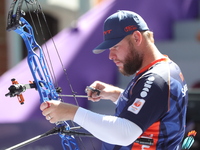 Mike Schloesser of the Netherlands competes against Sawyer Sullivan of the United States (not in picture) during the quarterfinals match on...