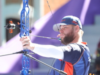 Mike Schloesser of the Netherlands competes against Sawyer Sullivan of the United States (not in picture) during the quarterfinals match on...