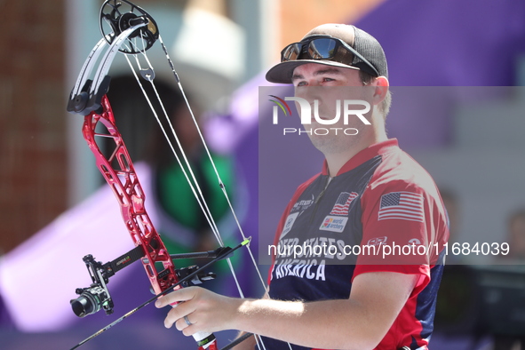 James Lutz of the United States competes against Nico Weiner of Austria (not in picture) during the quarterfinals match on the final day of...