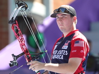 James Lutz of the United States competes against Nico Weiner of Austria (not in picture) during the quarterfinals match on the final day of...