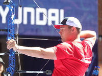 Nico Weiner of Austria competes against James Lutz of the United States (not in picture) during the quarterfinals match on the second day of...