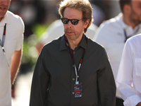 Movie producer Jerry Bruckheimer walks through the paddock at Circuit of the Americas in Austin, Texas, on October 19, 2024, during the Form...