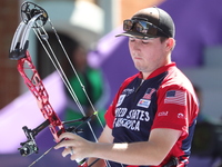 James Lutz of the United States competes against Nico Weiner of Austria (not in picture) during the quarterfinals match on the second day of...