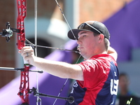 James Lutz of the United States competes against Nico Weiner of Austria (not in picture) during the quarterfinals match on the second day of...