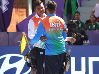 Priyansh and Prathamesh Balchandra Fuge of India compete during the quarterfinals match on the second day of the Tlaxcala 2024 Archery World...