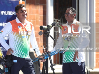 Priyansh of India competes against Prathamesh Balchandra Fuge of India (not in picture) during the quarterfinals match on the second day of...