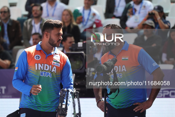 Prathamesh Balchandra Fuge of India competes against Priyansh of India (not in picture) during the quarterfinals match on the second day of...