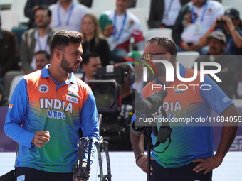 Prathamesh Balchandra Fuge of India competes against Priyansh of India (not in picture) during the quarterfinals match on the second day of...