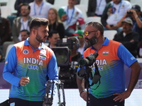 Prathamesh Balchandra Fuge of India competes against Priyansh of India (not in picture) during the quarterfinals match on the second day of...