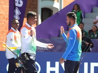 Priyansh and Prathamesh Balchandra Fuge of India compete during the quarterfinals match on the second day of the Tlaxcala 2024 Archery World...