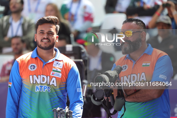 Prathamesh Balchandra Fuge of India competes against Priyansh of India (not in picture) during the quarterfinals match on the second day of...