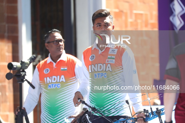 Priyansh of India competes against Prathamesh Balchandra Fuge of India (not in picture) during the quarterfinals match on the second day of...