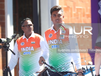 Priyansh of India competes against Prathamesh Balchandra Fuge of India (not in picture) during the quarterfinals match on the second day of...