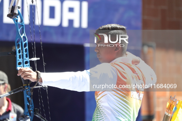 Priyansh of India competes against Prathamesh Balchandra Fuge of India (not in picture) during the quarterfinals match on the second day of...