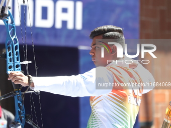 Priyansh of India competes against Prathamesh Balchandra Fuge of India (not in picture) during the quarterfinals match on the second day of...