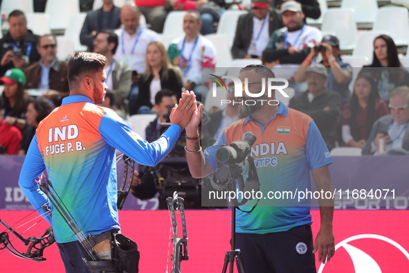 Prathamesh Balchandra Fuge of India competes against Priyansh of India (not in picture) during the quarterfinals match on the second day of...