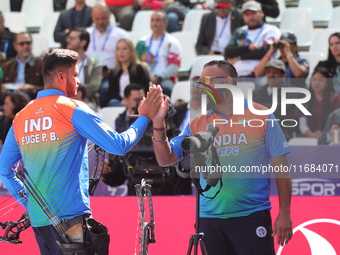 Prathamesh Balchandra Fuge of India competes against Priyansh of India (not in picture) during the quarterfinals match on the second day of...