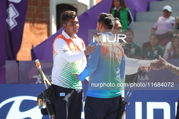 Priyansh and Prathamesh Balchandra Fuge of India compete during the quarterfinals match on the second day of the Tlaxcala 2024 Archery World...