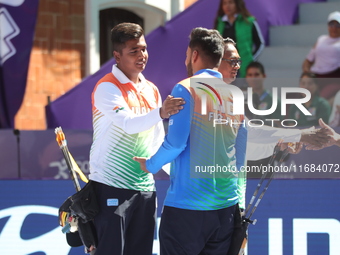 Priyansh and Prathamesh Balchandra Fuge of India compete during the quarterfinals match on the second day of the Tlaxcala 2024 Archery World...