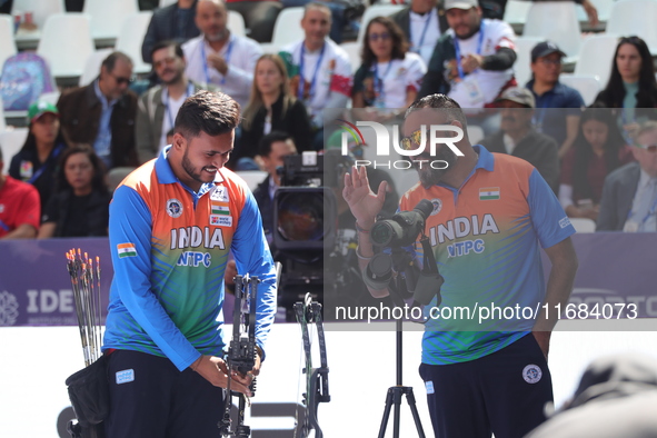 Prathamesh Balchandra Fuge of India competes against Priyansh of India (not in picture) during the quarterfinals match on the second day of...