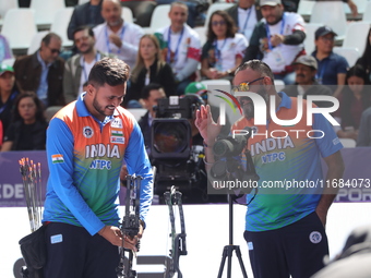 Prathamesh Balchandra Fuge of India competes against Priyansh of India (not in picture) during the quarterfinals match on the second day of...