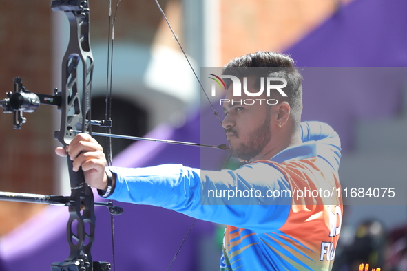 Prathamesh Balchandra Fuge of India competes against Priyansh of India (not in picture) during the quarterfinals match on the second day of...