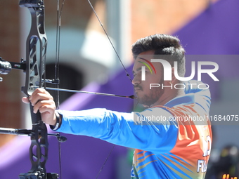 Prathamesh Balchandra Fuge of India competes against Priyansh of India (not in picture) during the quarterfinals match on the second day of...