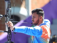 Prathamesh Balchandra Fuge of India competes against Priyansh of India (not in picture) during the quarterfinals match on the second day of...