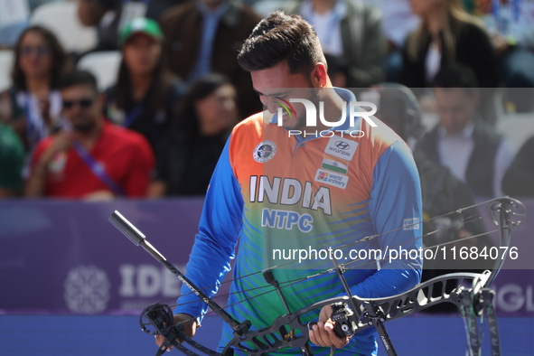 Prathamesh Balchandra Fuge of India competes against Priyansh of India (not in picture) during the quarterfinals match on the second day of...