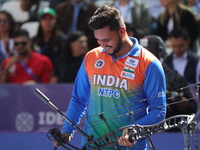 Prathamesh Balchandra Fuge of India competes against Priyansh of India (not in picture) during the quarterfinals match on the second day of...