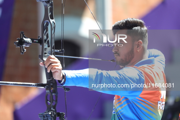 Prathamesh Balchandra Fuge of India competes against Priyansh of India (not in picture) during the quarterfinals match on the second day of...