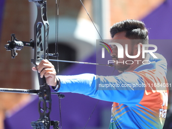 Prathamesh Balchandra Fuge of India competes against Priyansh of India (not in picture) during the quarterfinals match on the second day of...